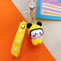 ** Móc khóa vịt đội nón vàng tai mickey