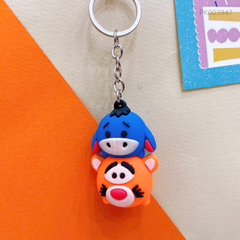 ** Móc khóa silicon đầu hổ cam và bò xanh