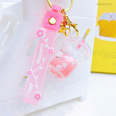 ** Móc khóa nước ly kitty ống hút hồng