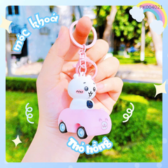 ** Móc khóa đồ chơi thỏ xe kéo trớn