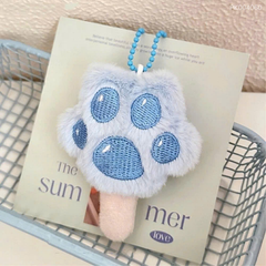 ** Móc khóa bông que chân mèo