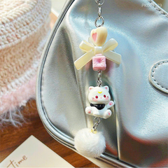** Dây đeo điện thoại mèo bông vãy tay