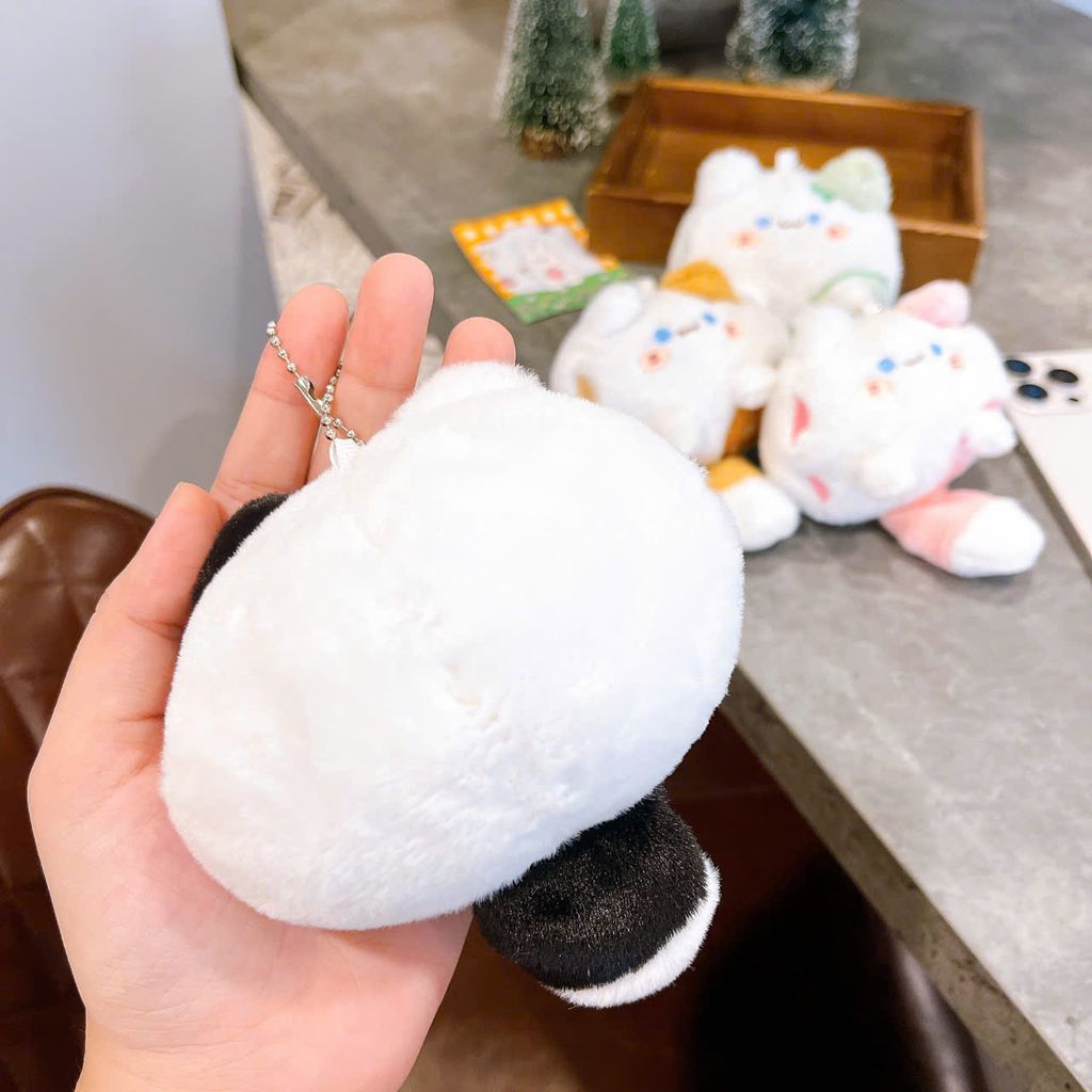 ** Móc khóa bông mèo bóp đuôi kêu