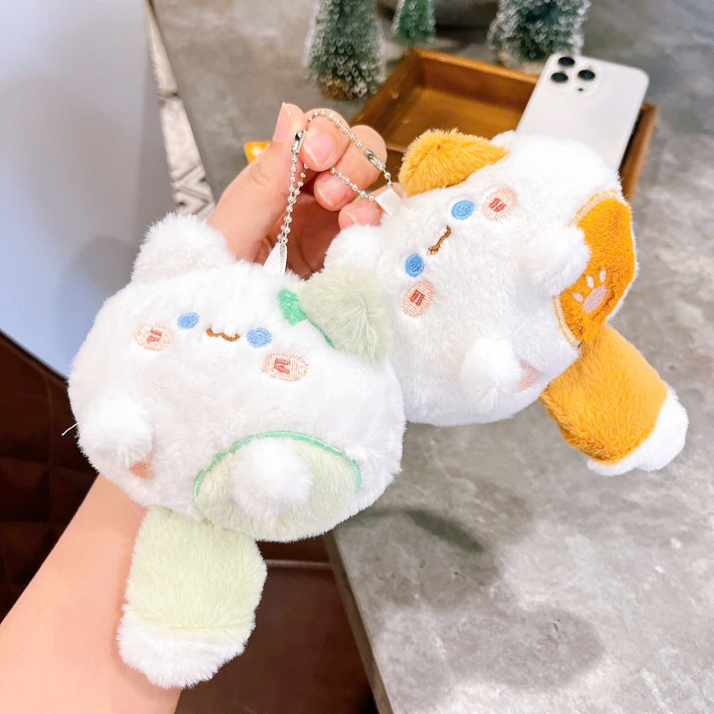 ** Móc khóa bông mèo bóp đuôi kêu