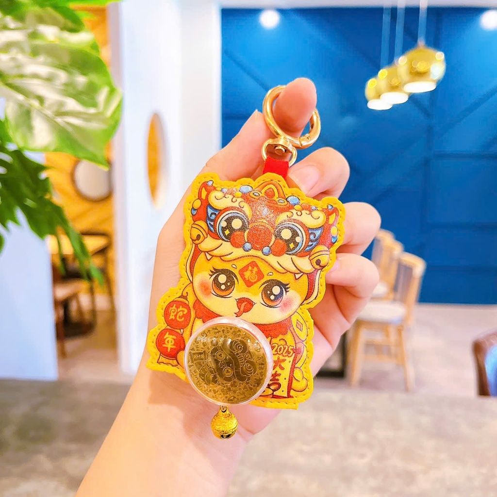 ** Móc khóa da túi tiền đỏ xoay đồng xu