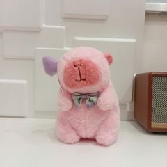** Gấu bông Capybara hồng đeo nơ