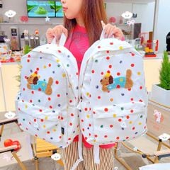 ** Balo chấm bi cún lạp xưởng