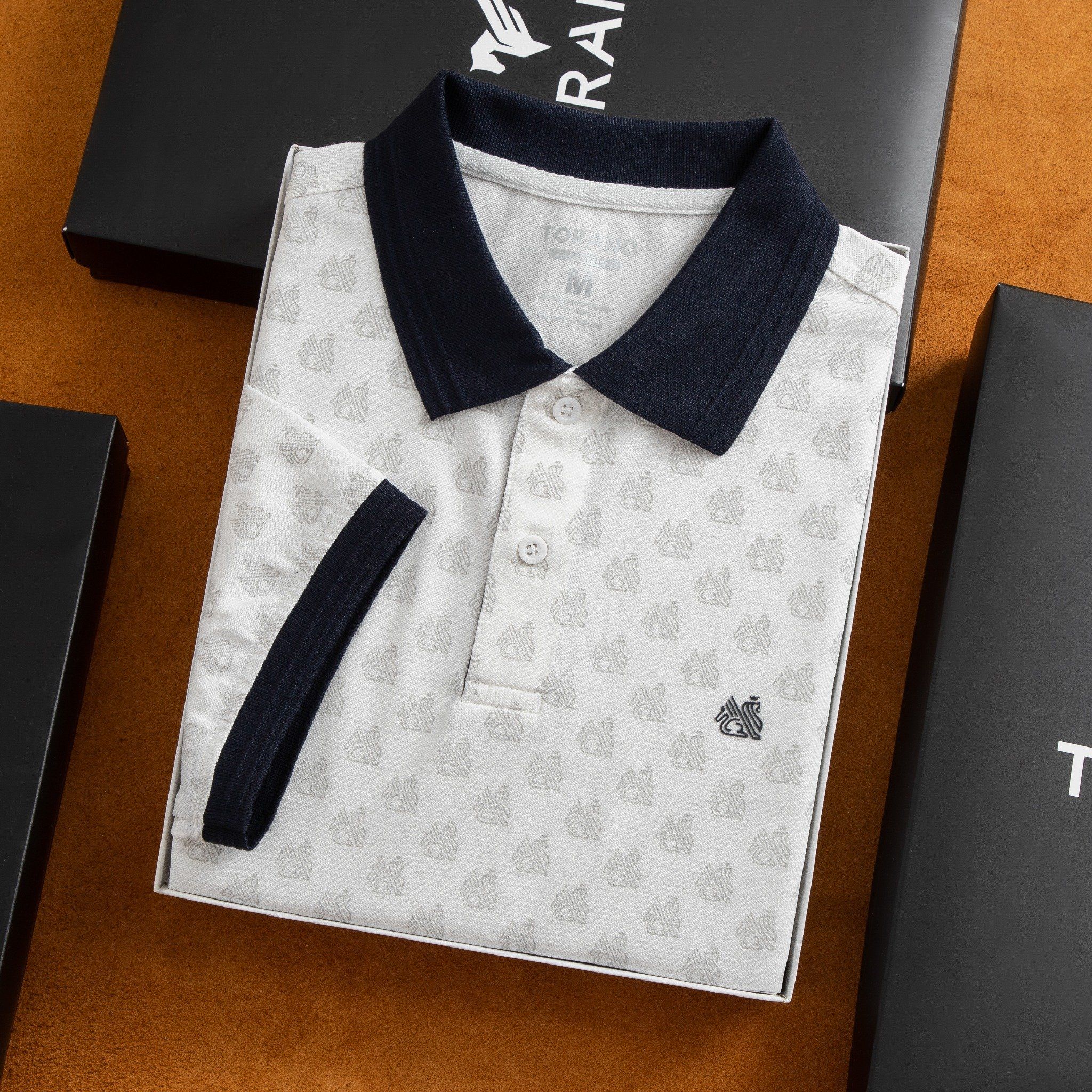  Áo polo monogram in tràn họa tiết GSTP051 