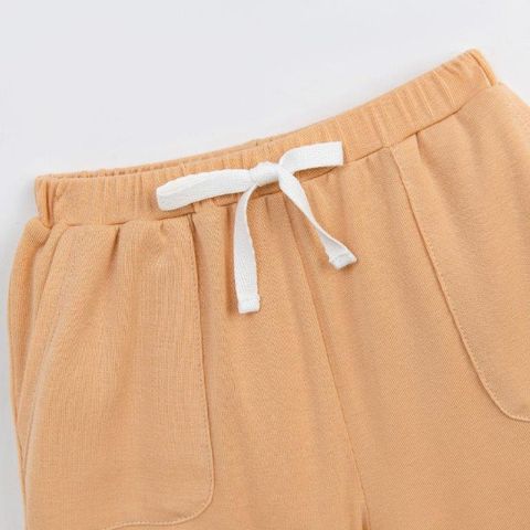  Bộ cộc áo trắng in hình gấu phối quần màu cam 