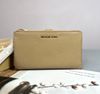Ví Cầm Tay Wallet Michael Kors Jet Set Double Zip Wristlet  Màu Camel