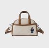 Túi Đeo Chéo WHOAU Steve Canvas 2 Way Mini Bag WHBGF2213A Màu Trắng Viền Nâu