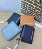  Ví Marc Jacobs Groove Mini Compact Wallet Smoke Almond Màu Đen / Xanh / Nâu / Navy 