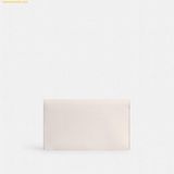  Túi Đeo Chéo Coach Essential Clutch Màu Trắng 