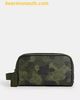 Túi Cầm Tay Coach Small Travel Kit In Signature Green