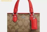  Túi Trống Coach Mini Rowan Crossbody In Signature Canvas Mầu Nâu Logo Viền Đỏ CR338 