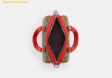  Túi Trống Coach Mini Rowan Crossbody In Signature Canvas Mầu Nâu Logo Viền Đỏ CR338 