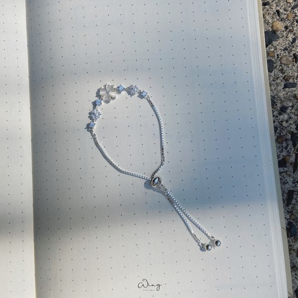  Lắc Tay Cỏ 4 Lá Đá Trắng (Chiếc) 