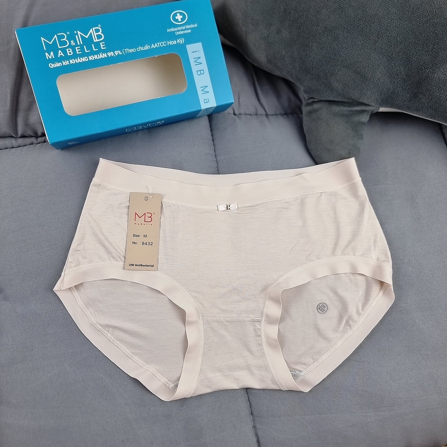 A pair of Dayhan leakproof reusable period underwear laid flat.