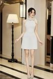  Váy trắng cổ yếm cột nơ viền đá HIU 