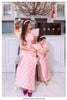  Áo dài hồng và mấn SHE 