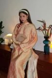  Áo dài cam quần vàng HUONG BOUTIQUE 