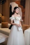  Váy dài trắng dây cột cổ LINH PHUNG 