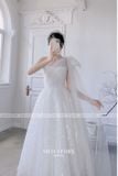  Váy trắng xòe nơ chéo vai MEO STORE 