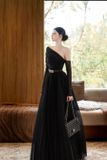  Set áo tay dài 1 bên vai kèm chân váy đen dài kết hợp thắt lưng DARLING DIVA 