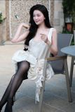 Váy kem ngắn dáng bí đính bông bên hông PHAM 