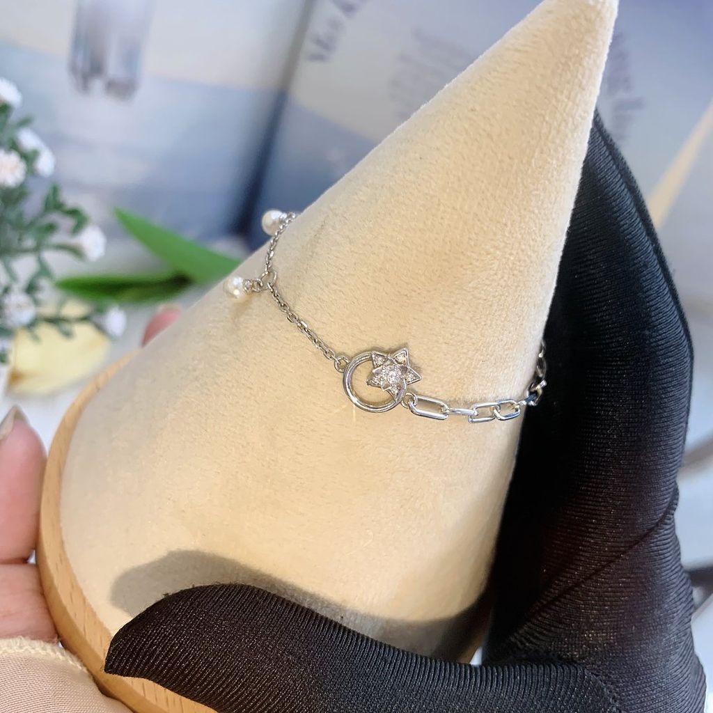 Lắc tay bạc Thụy Sĩ họa tiết ngôi sao đính Ngọc trai và đá Moissanite ROWLER BH000908