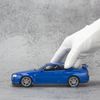 Mô hình xe Nissan Skyline GT-R R34 1:24 Welly Blue (5)
