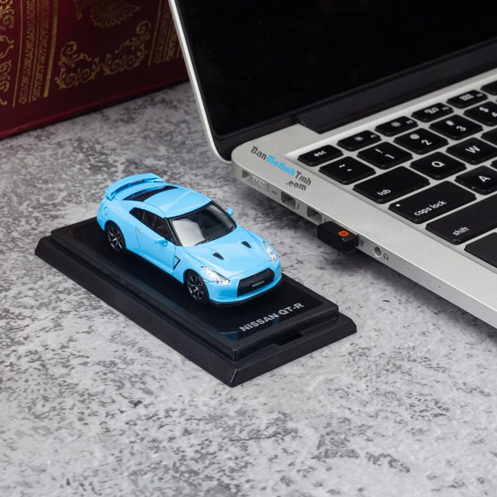 Mô hình xe Nissan GTR 1:64 Dealer Light Blue giá rẻ (7)