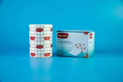  Cuộn băng keo y tế co giãn Tigerplast Carifix Stretch dán bông gạc - Tấm 10cm dài 10m 