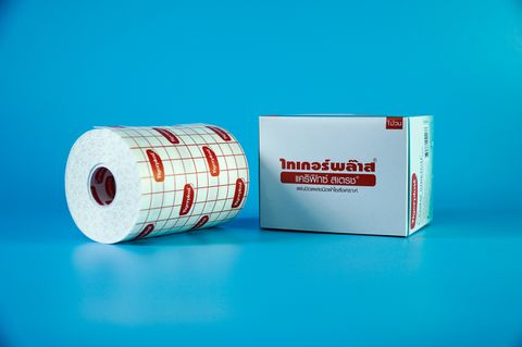  Cuộn băng keo y tế co giãn Tigerplast Carifix Stretch dán bông gạc - Tấm 10cm dài 10m 