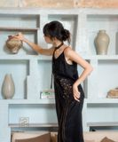  Đầm hai dây thêu cỏ lau sắc màu. 