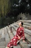 Áo dài tơ đỏ thêu lược 