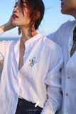  Áo sơ mi thêu Unconditional - Trắng 