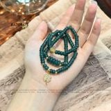  Vòng Chuỗi Lam Ngọc Bánh Xe 5.2Ly Ngũ Điếu Mix Charm Cỏ Bốn Lá Và  Kim Tiền Vàng Trang Sức (Không Kén Mệnh) 2-126006 