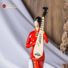 Tượng Cô Gái Việt Nam Đánh Đàn