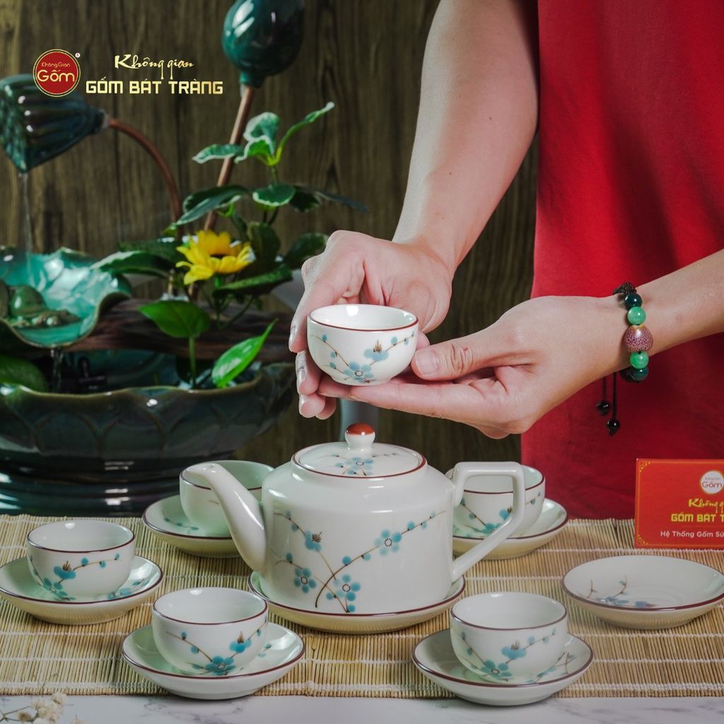 Bộ Ấm Chén Vai Cao Men Kem Vẽ Đào Xanh