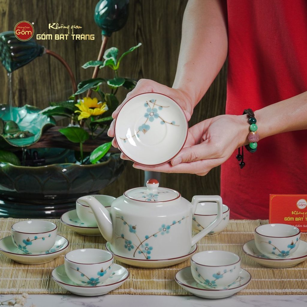 Bộ Ấm Chén Vai Cao Men Kem Vẽ Đào Xanh