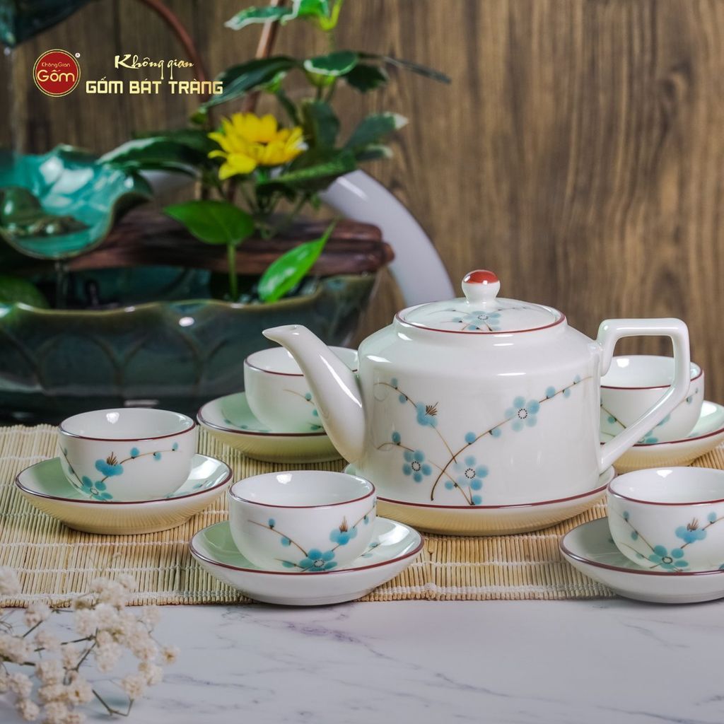 Bộ Ấm Chén Vai Cao Men Kem Vẽ Đào Xanh