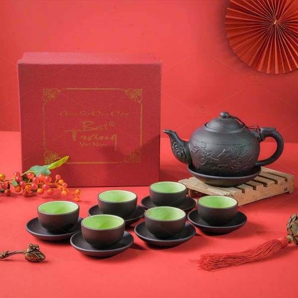 Bộ trà tử sa đen rồng đắp nổi