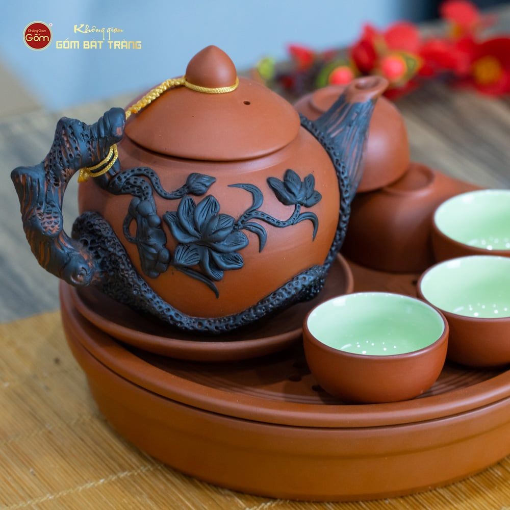 Bộ Ấm Trà Tử Sa Đắp Nổi Hoa Mẫu Đơn Khay Thủng