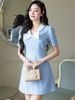Đầm xanh cổ trắng đính nơ