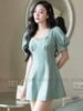 Đầm xanh mint tay phồng cúp ngực