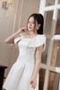 Đầm trắng tay bồng