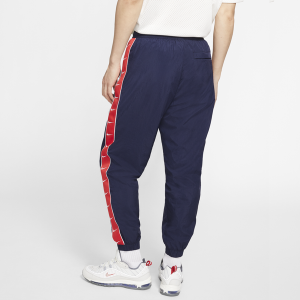 Quần Dài Nike Taped Swoosh Popover Pants