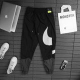Quần Dài Nike Big Swoosh Woven Lined Track Pants
