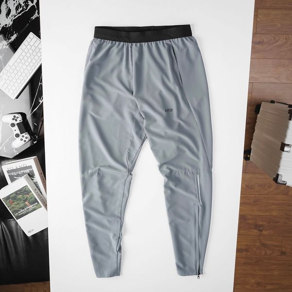 Quần dài Ura Phenom Elite Running Pants